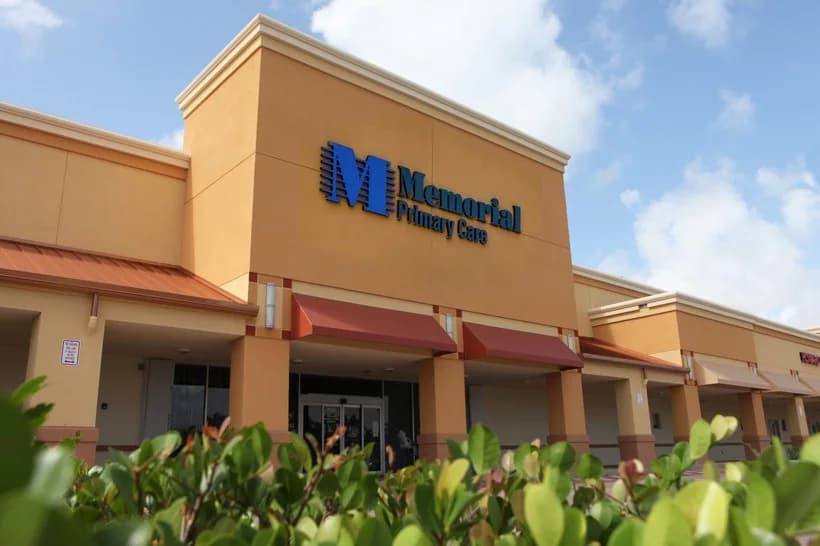 Tan building exterior with Memorial Urgent Care signage