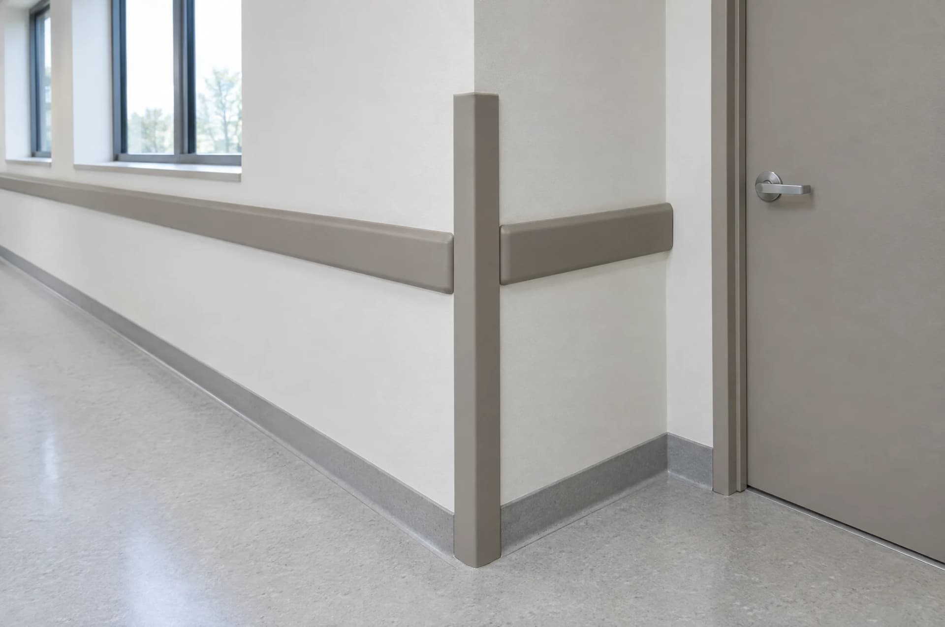 AI-generated editorial illustration of a wall protection rail and corner guard beside a doorway